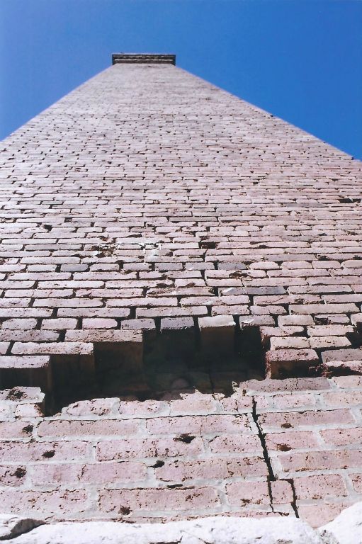 The view looking straight up the smelter stack really makes you feel small.  Notice how near the bottom, quite a few of the red bricks have fallen away.  The sad truth is that it is only a matter of time until the smelter stack falls down.  Please do not hasten the collapse by taking bricks home as souvenirs: