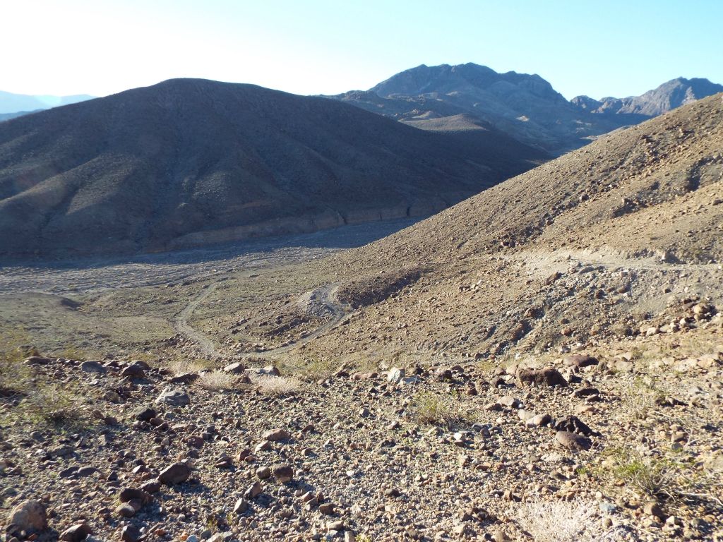 The old road crests and then drops 250 feet in steep elevation into Anvil Spring Canyon.  Coming back at the end of the day, the climb up will be dreaded: