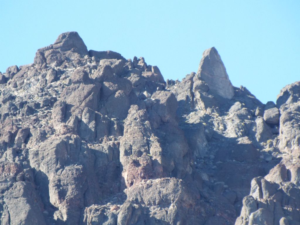 Looking up toward the actual summit, there are some interesting rock shapes up high: