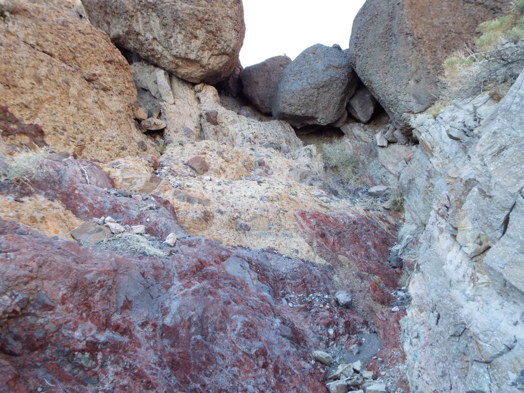 In the next four pictures, notice how we began climbing through a series of boulder blockades in the middle of the gorge: