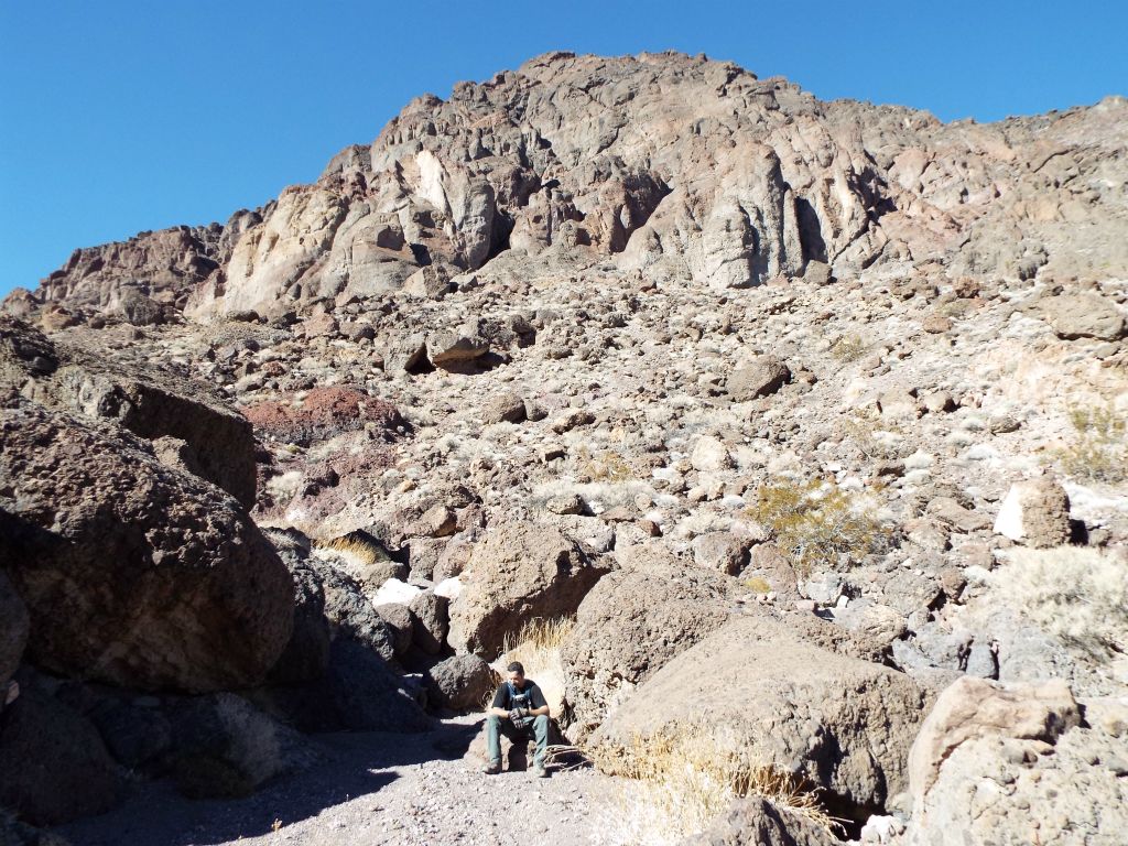 Jim taking a short break as we still had a fair amount of elevation to gain before reaching the summit (seen behind him):
