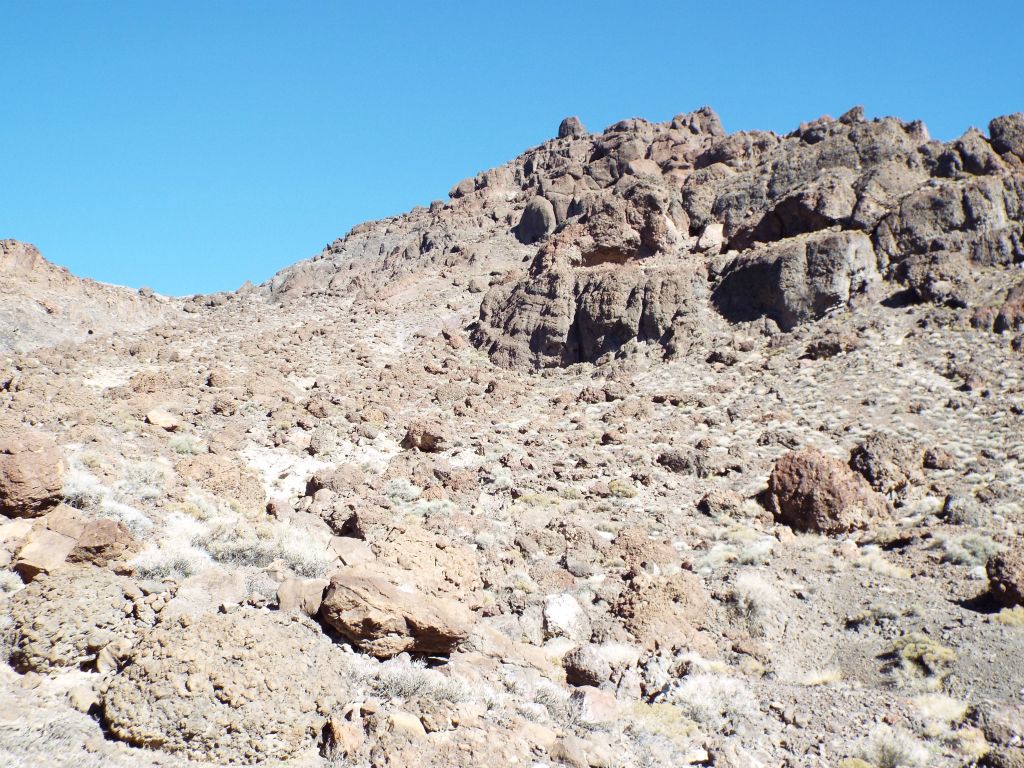 We were now hiking through a small enclosed valley as we continued circling around toward the summit: