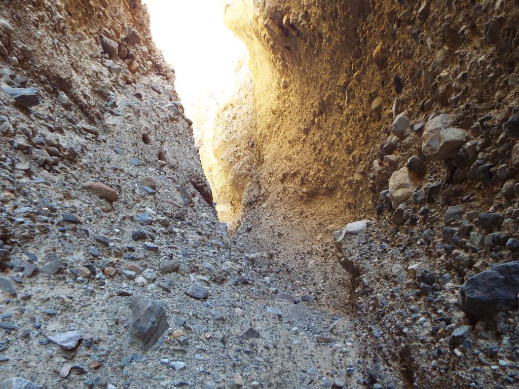 Up ahead, TB Slot 3 became steeper and sunshine filtered into the canyon: