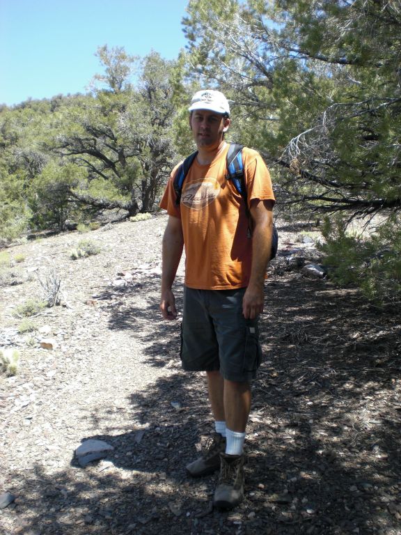 Steve taking a short break from the summer heat along the trail: