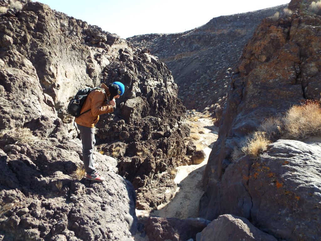 Josh looking over an even more major dry fall than the one we had carefully climbed down earlier: