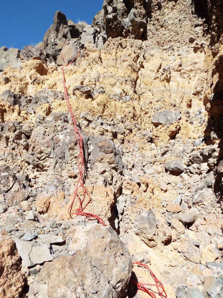 This view shows the crumbly rock which makes the down climb potentially treacherous.  It wouldn't be the best area to have rocks give way and sustain a fall: