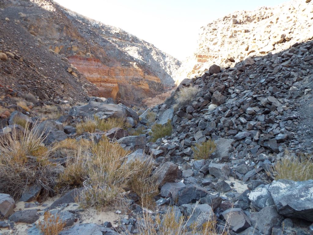 Rocks and boulders were pouring down from the hillsides and covering the wash: