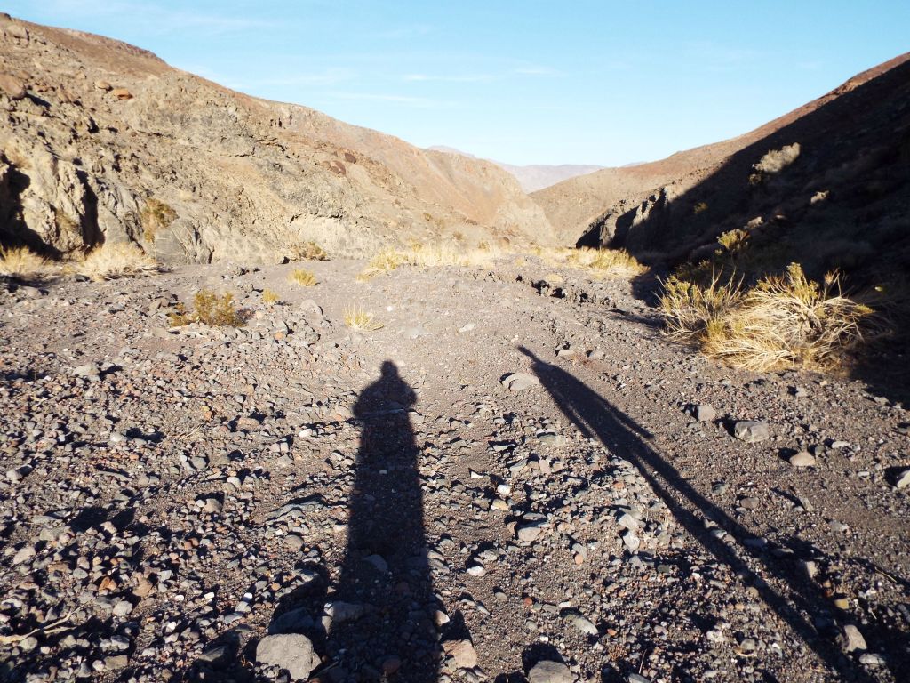 Our shadows were growing longer with still half of the hiking distance to complete.  The hike is 8 miles from the start to the Lee Wash MSC and another 8 miles from here to the parking area across Panamint Valley:
