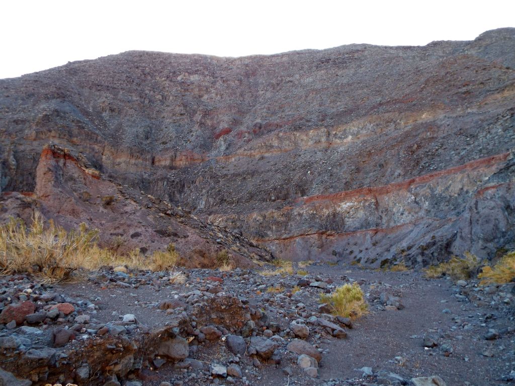 Notice the triangular rock outcropping in the middle of the wash: