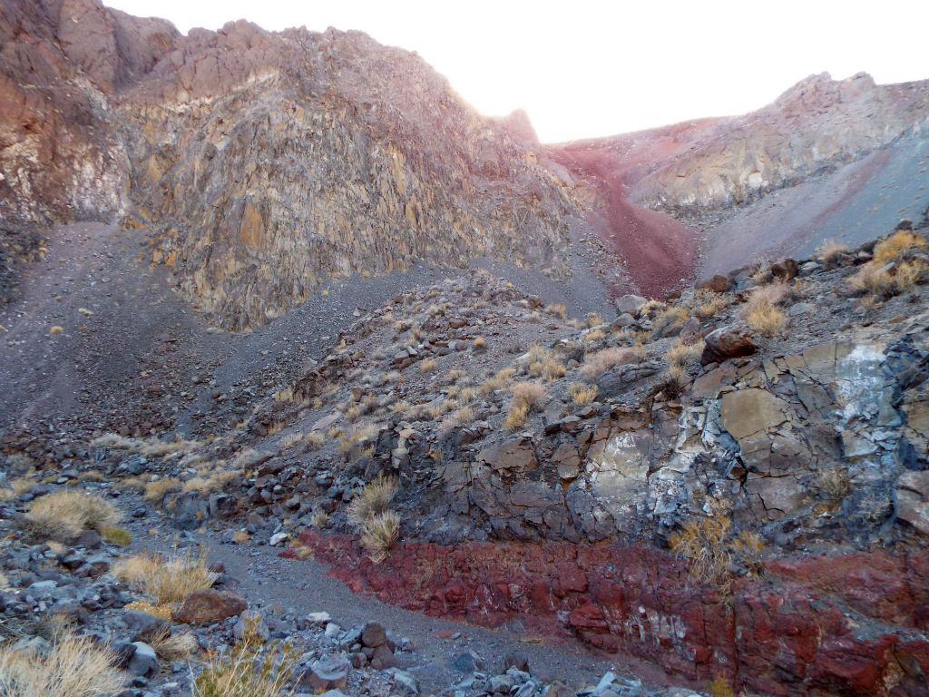 The color of the bottom canyon wall matches that of the massive rockslide coming down from the ridge: