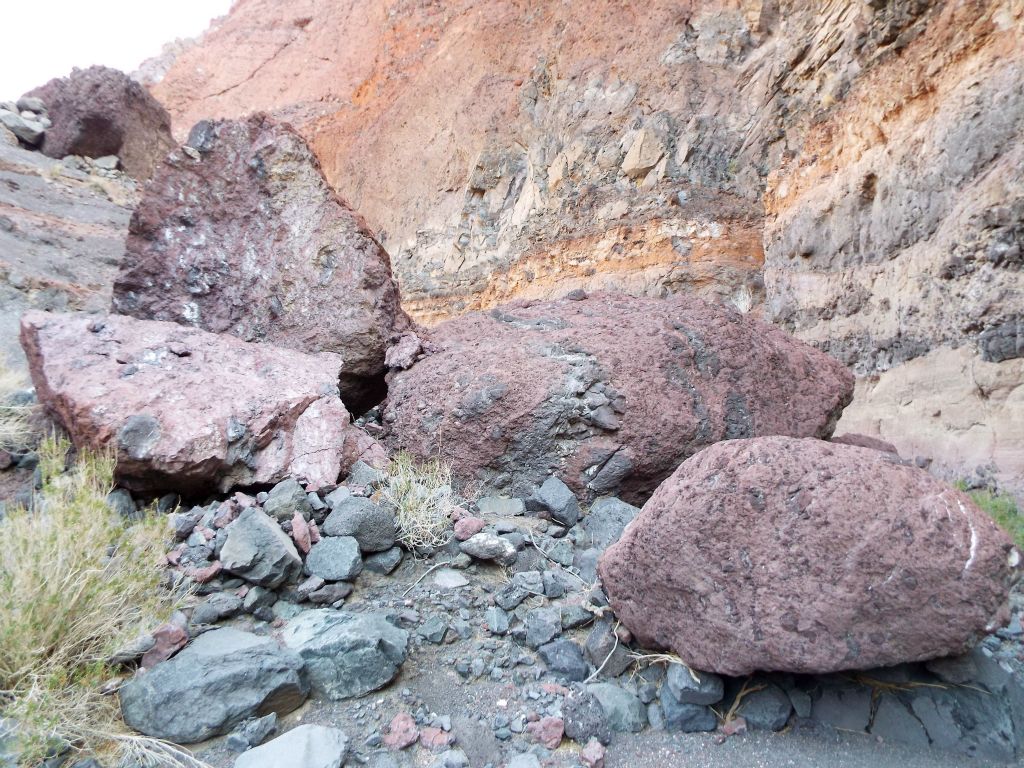 Here are more of the giant purple boulders which have rolled into the wash: