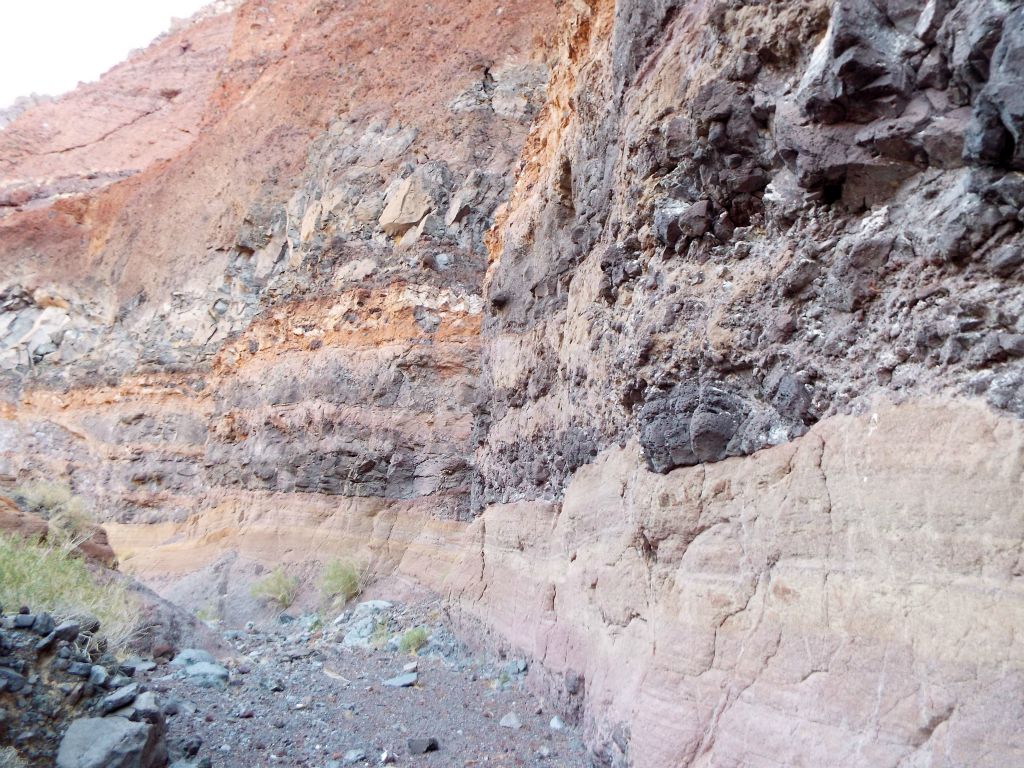 This was such an impressive spot to walk through the wash right along the base of the huge vertical canyon wall: