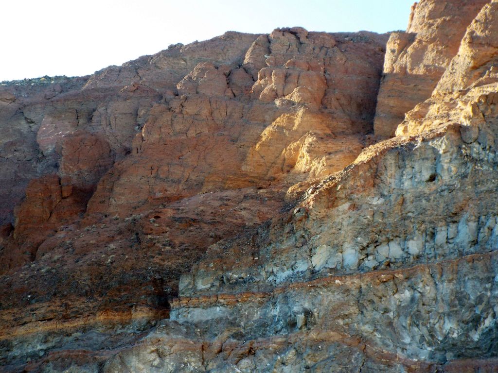 A towering slot with a dry fall at the back is visible at the upper right: