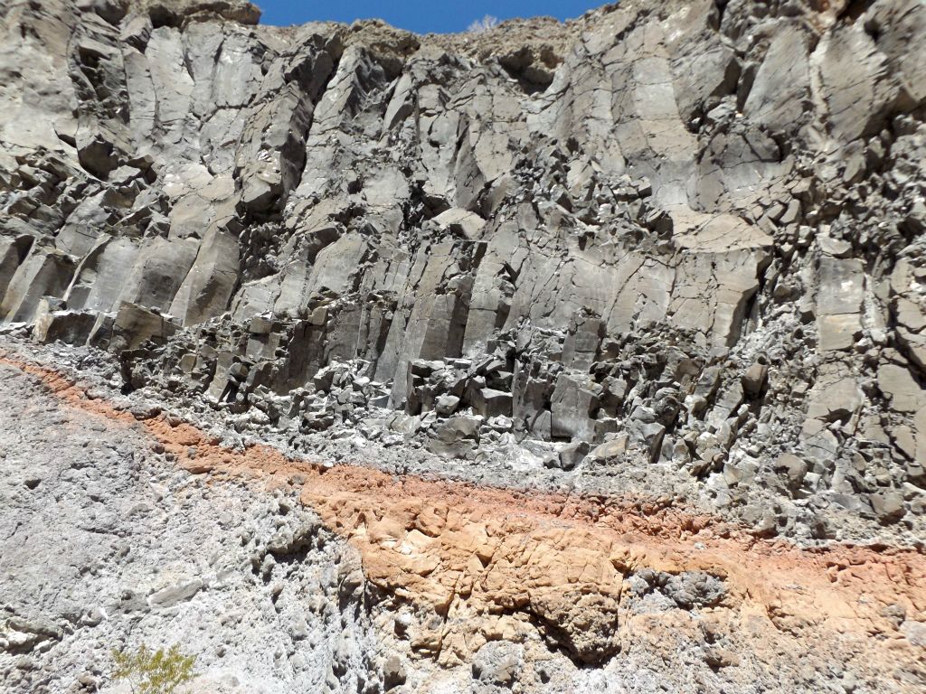 The rocks on this canyon wall look similar to those formed by columnar jointing: