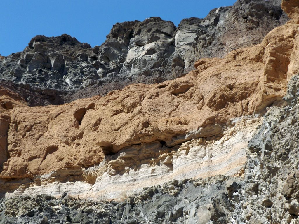 A neat spot with bulgy orange rock transitioning into smooth rock with a combination of white and orange: