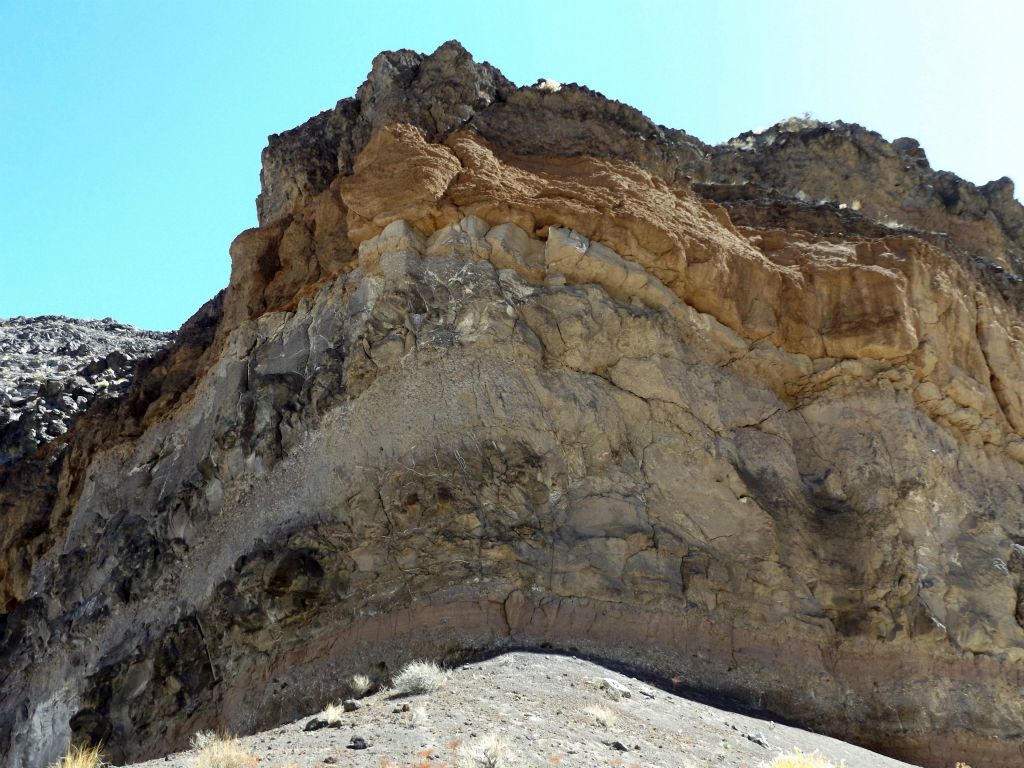 At least four very distinct rock layers can be seen here: