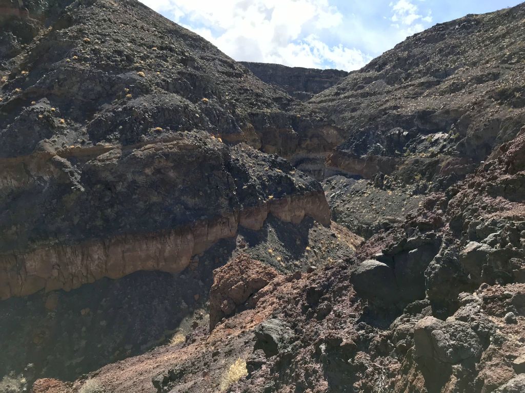 After looking around for a while, I found a route up that I decided to attempt.  It would have involved a lot of wasted effort had it not gone through.  Here was my view looking up canyon as I climbed the steep slopes: