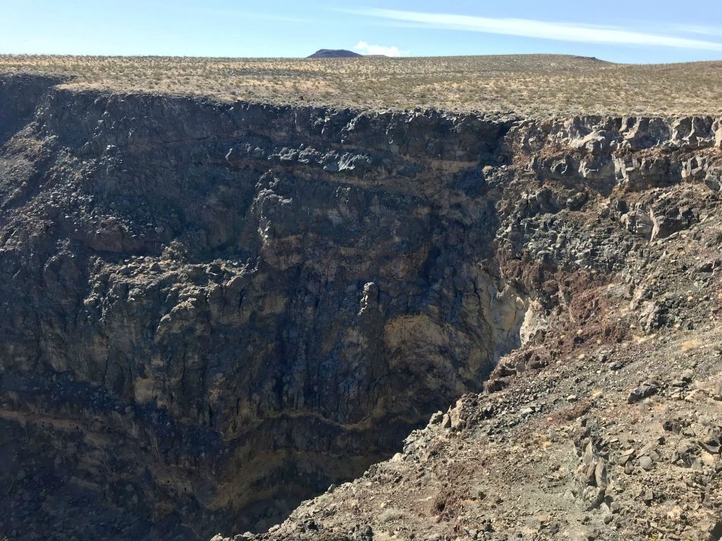 Walking a short distance along the western side and looking back at the 1st major dry fall and sheer cliffs: