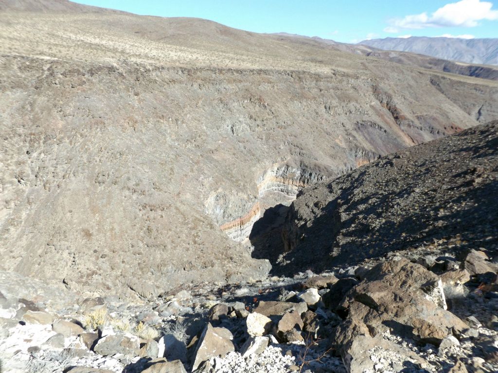 Looking into the middle canyon, there were soon glimpses of colorful canyon walls below:
