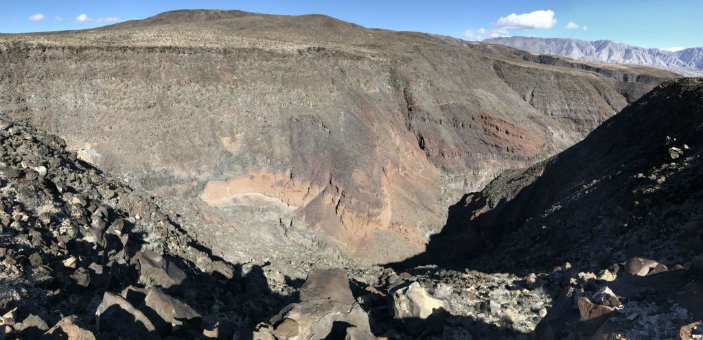 Panoramic of the middle canyon and expansive colorful hillsides far below: