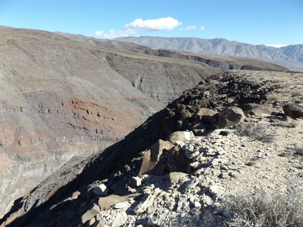 Many of the cliffs along this side of the canyon rim sloped down before dropping off vertically later: