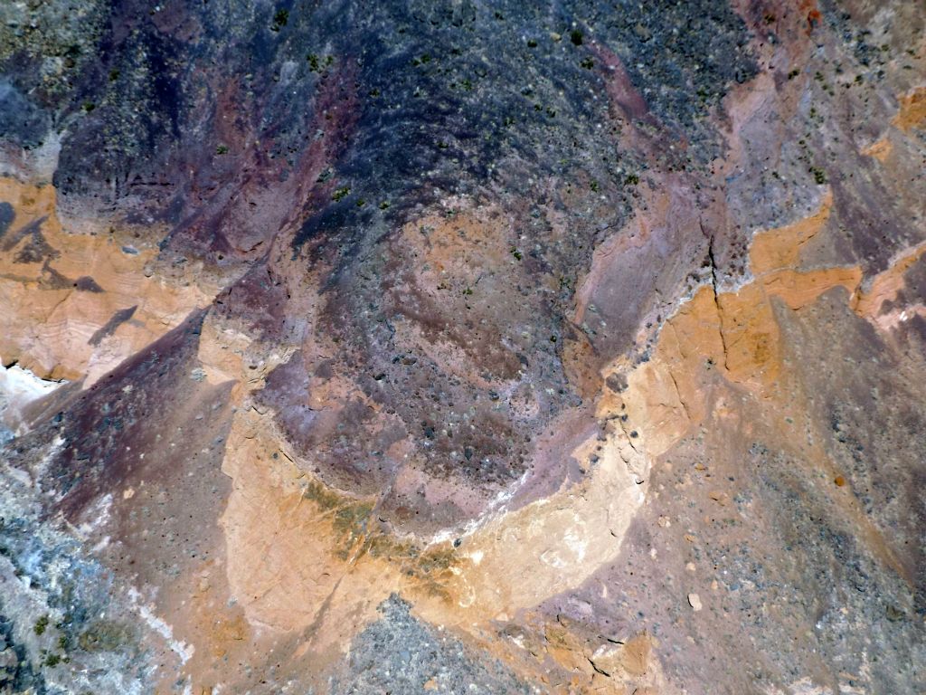 The next six pictures show close-ups of some of the colorful hillside terrain seen far below: