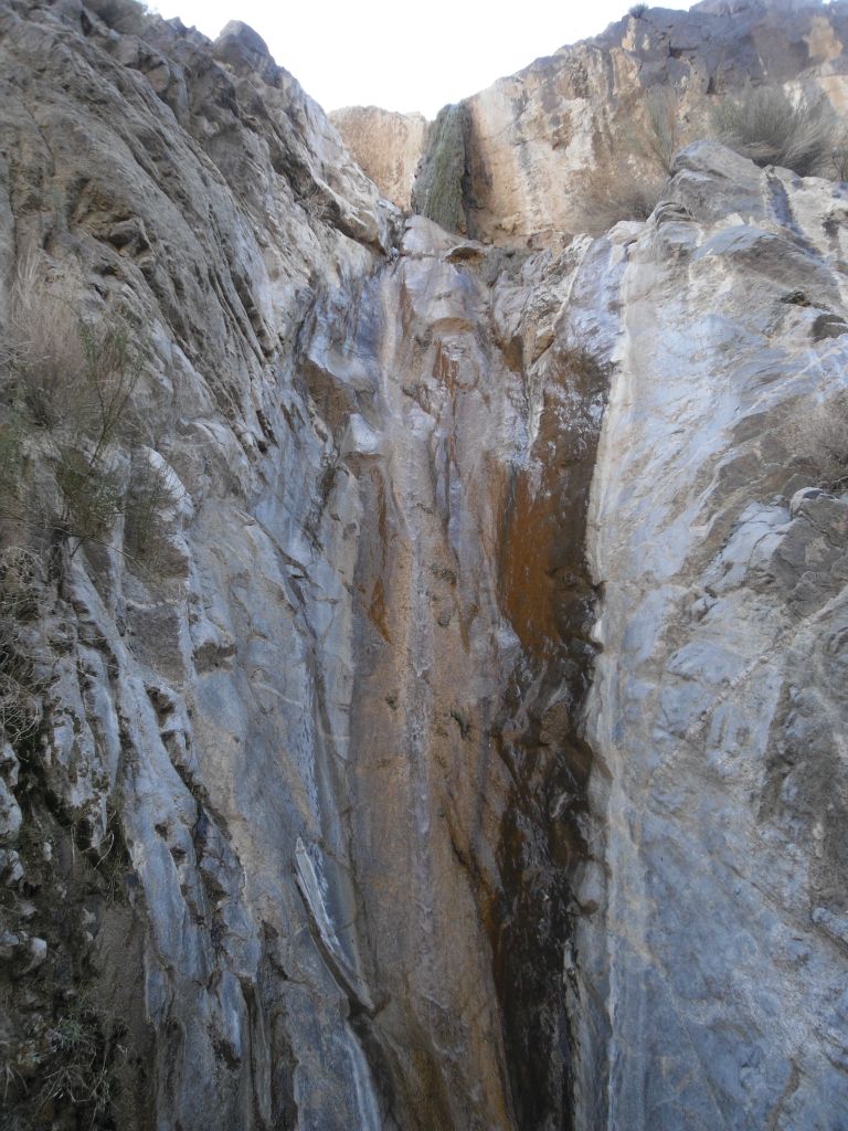 First view of the two-stage 50 foot waterfall of Mill Canyon: