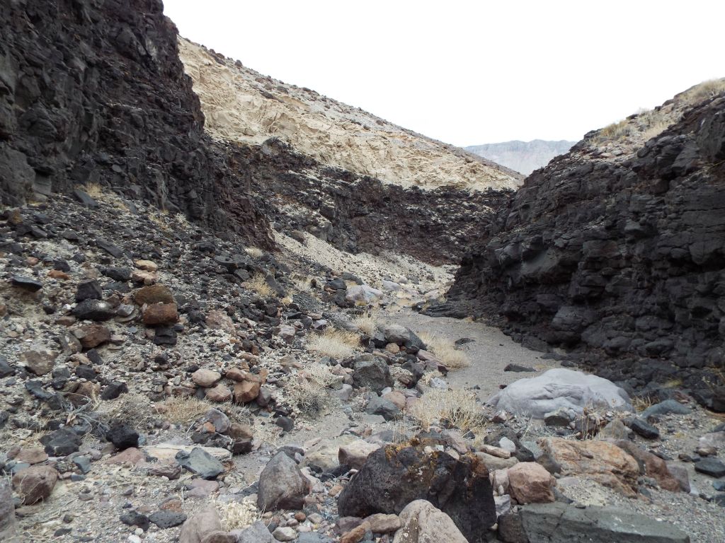 Past the tafoni narrows, there was a completely different type of darker rock which took over the canyon: