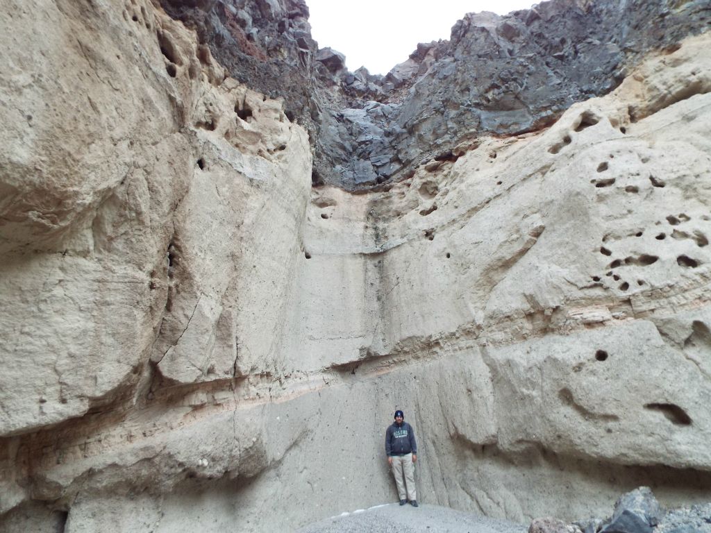 Getting a picture at the base of the 100-foot major dry fall and Polished Stone Grotto area:
