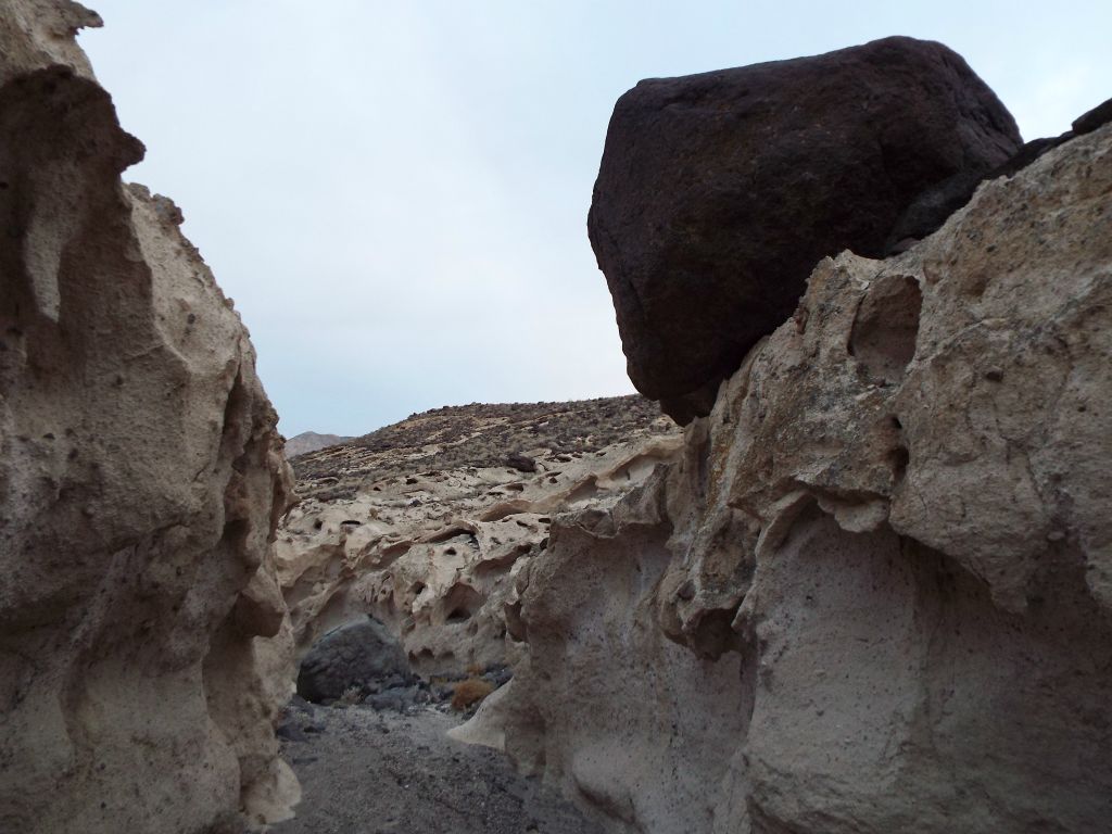 This boulder looks like it is ready to roll into the canyon and possibly create a climbing obstacle: