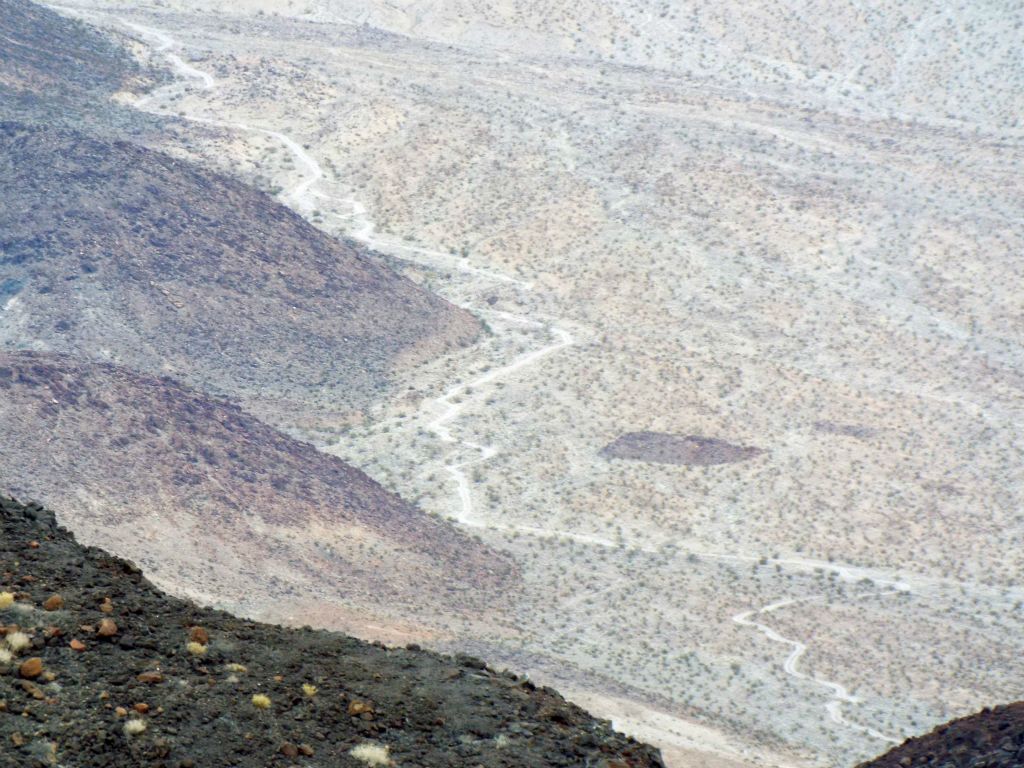 Looking down on the Steel Pass Road as it turns to the northeast and heads uphill: