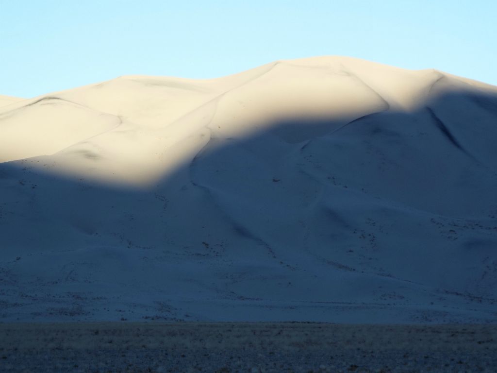 A closer look at the contrast between light and shadows during the morning sunrise: