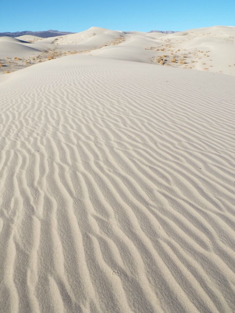 Every time I visit sand dunes systems in Death Valley (with the exception of the Mesquite Dunes), I'm looking to photograph pure untouched sand like this: