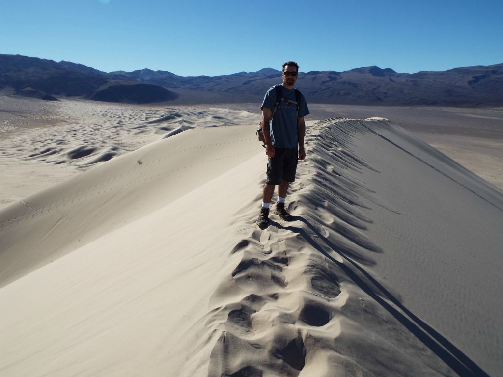 Looking back from the first summit at Jim and the back half of the dunes: