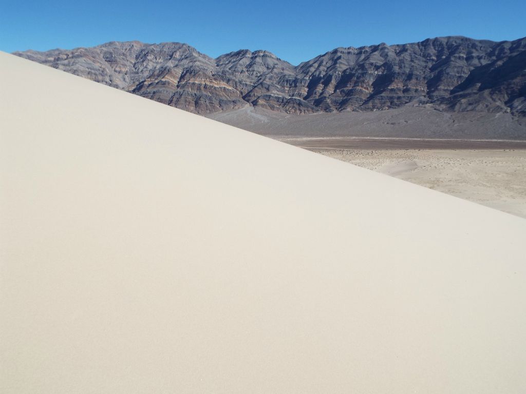 The long slope of the sand mountain framing the Last Chance Range: