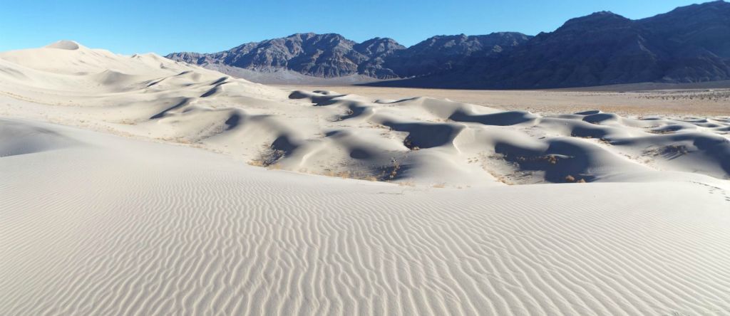 An incredible panoramic showcasing the sand patterns and shadows of the back half of the Eureka Dunes: