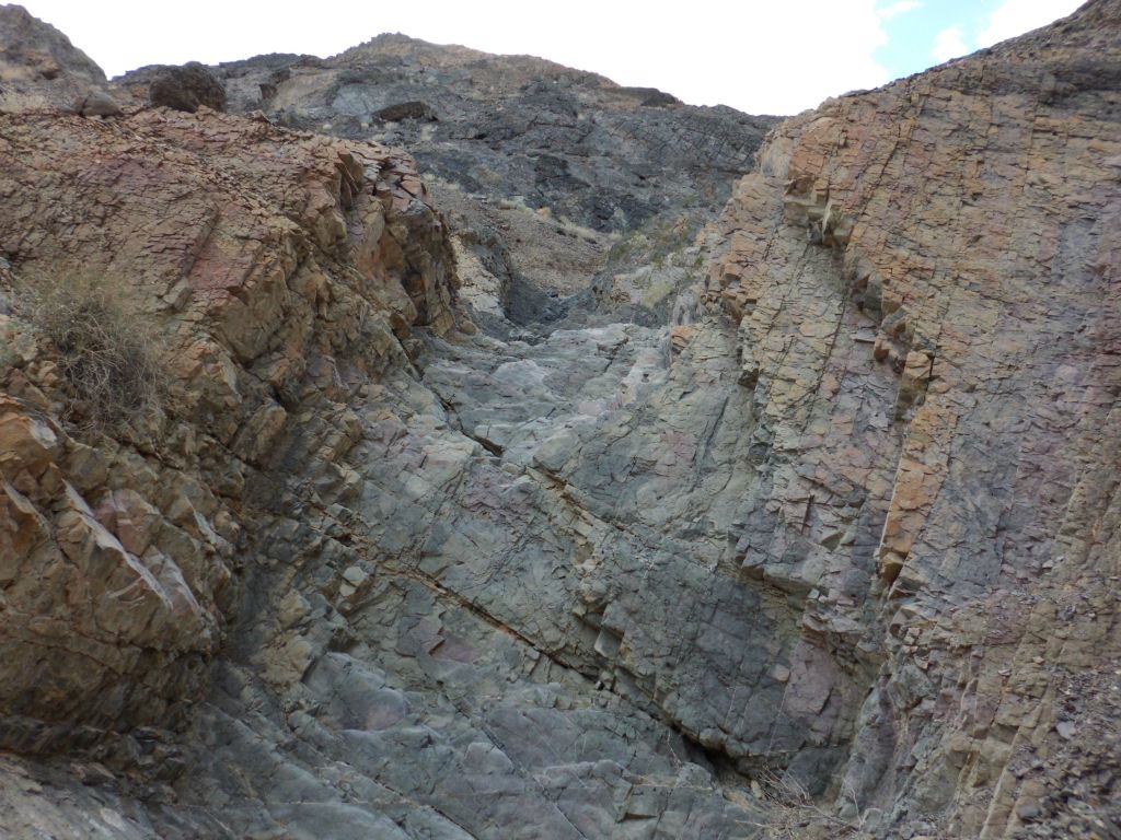 Turning a corner, this dry fall stunned me.  Check out the colors on display, with red on the left and orange on the right: