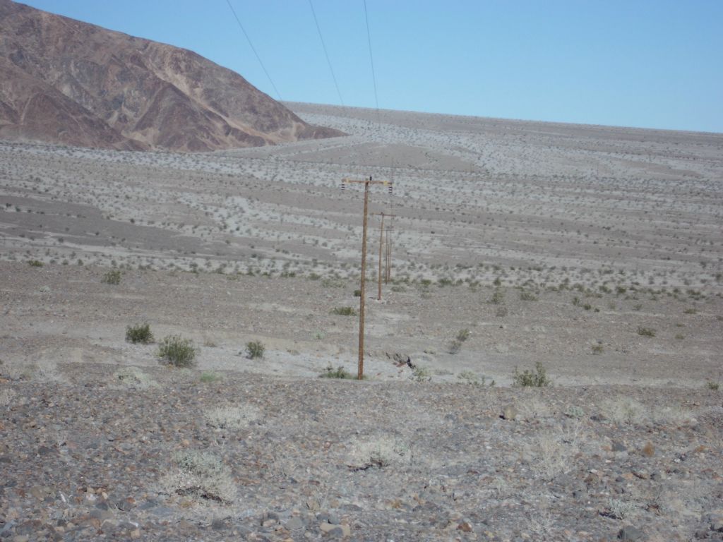 Looking out at the telephone poles as they head toward Stovepipe Wells: