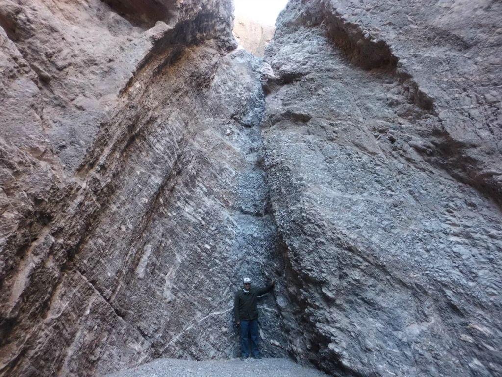 A picture of Steve standing at the base of the dry fall: