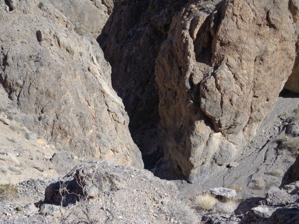 It looked like the only way to get down would be to follow close to the rock edge just above the dry fall.  But it was too steep, so we called off the hike: