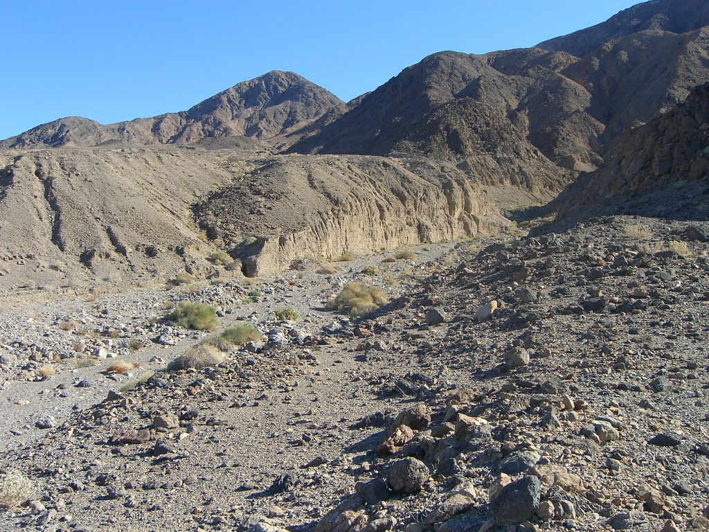 At this critical junction, the key is to cross this wash and continue up the small gully and onto the hillside straight ahead: