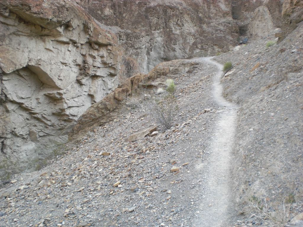 New hikers can learn about bypassing dry falls.  To do this, it is necessary to backtrack a short distance back down the canyon and look for this bypass trail heading up and around the dry fall: