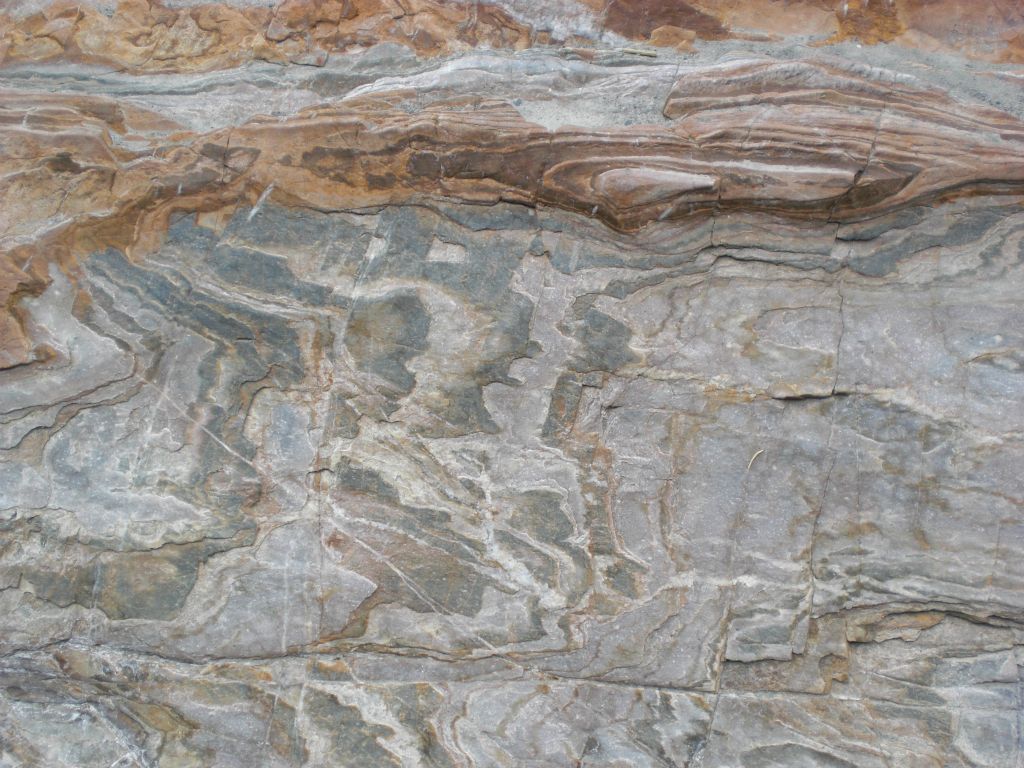 Odd shapes appearing on the canyon wall: