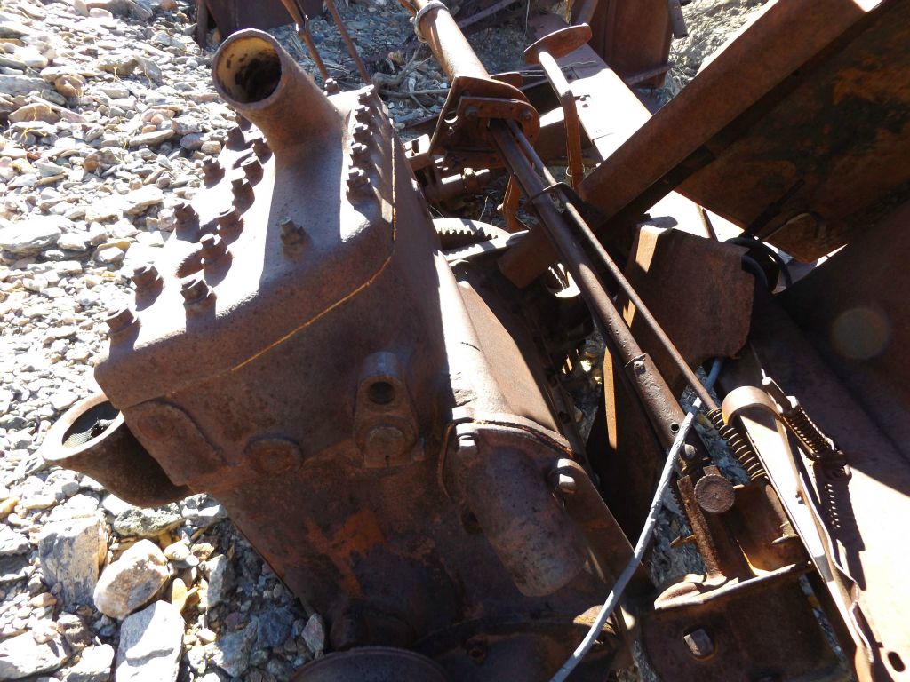 The next three pictures show close-ups of the engine, flywheel with starter gear, and part of the clutch mechanism: