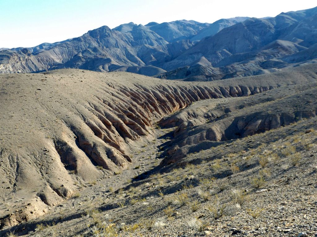 Having climbed the first ridge, this is the view down into the middle wash between the two major canyons.  I needed to find a safe way down into the middle wash: