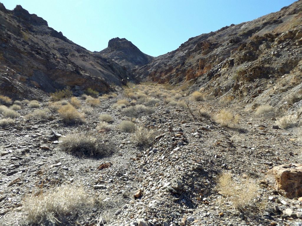 One notable aspect of the early canyon was the towering rock formations high above on the hillsides.  Notice one such formation in the distance: