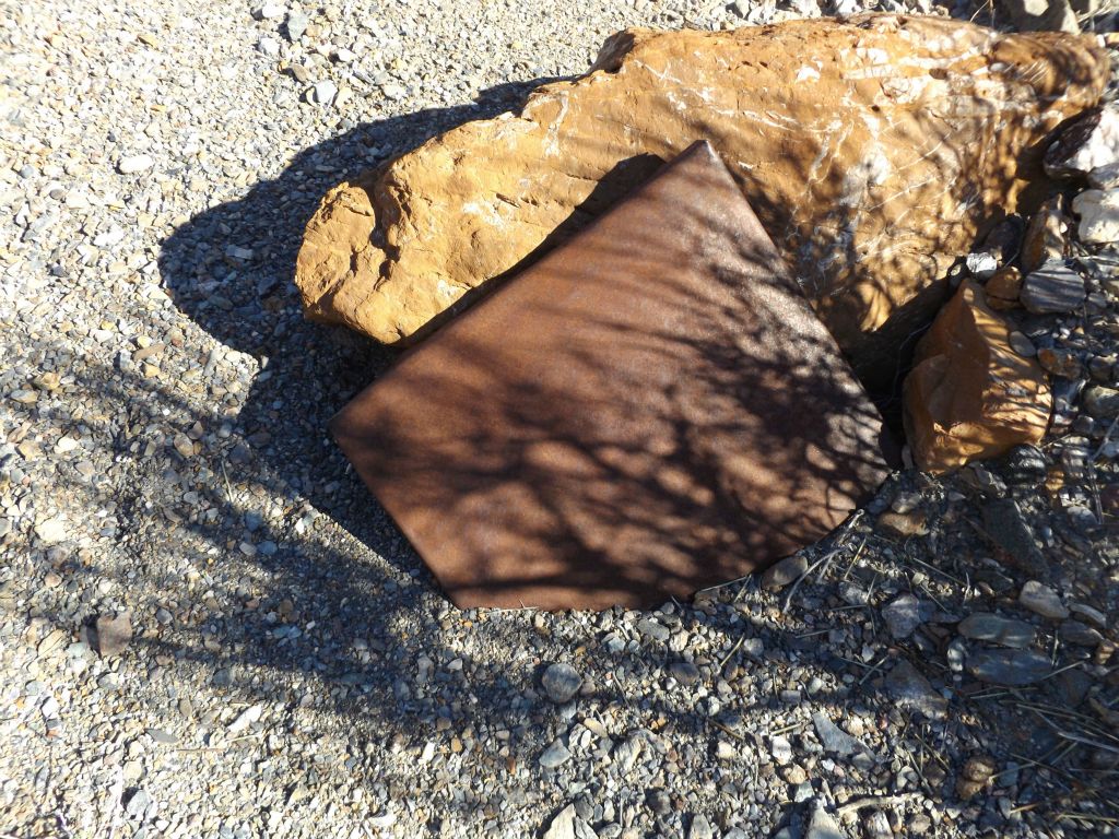 Looking up canyon, I was surprised to see an old car in the wash.  I then realized these pieces were slowly washing downstream during flash floods: