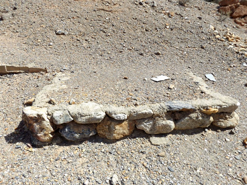 This is possibly a stone foundation for an old miner's tent site: