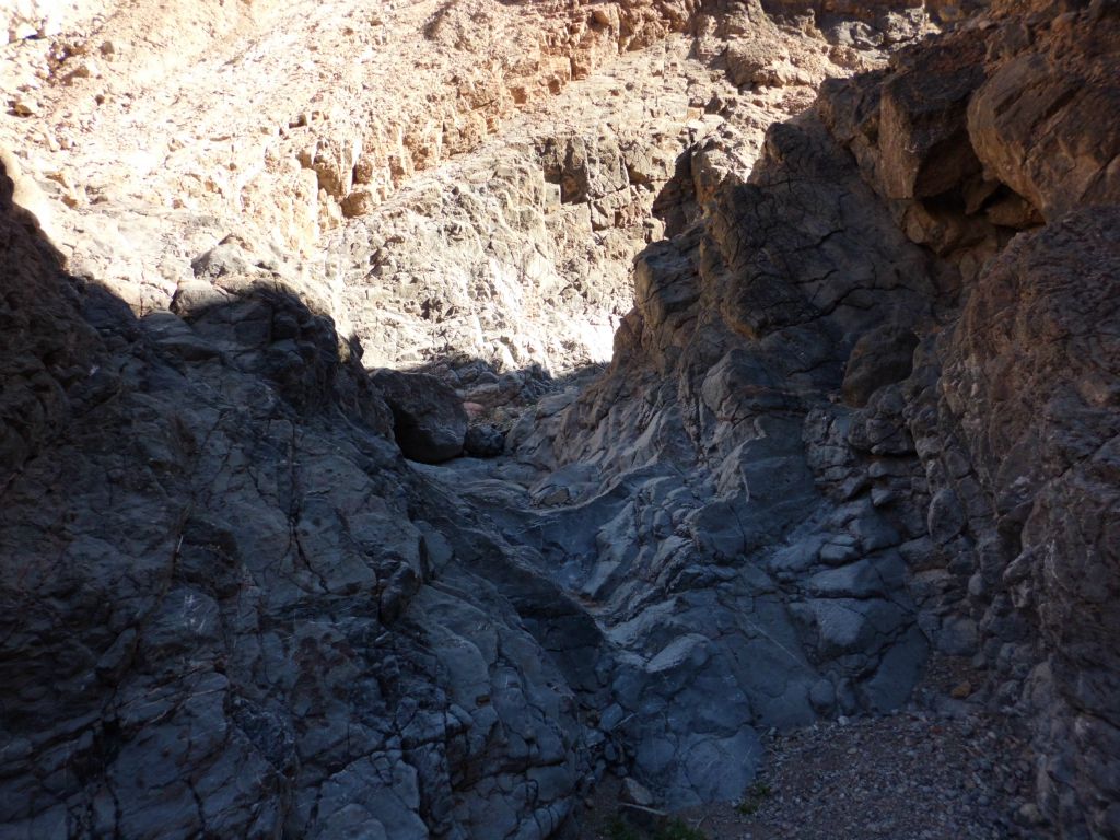 The canyon floor alternated between solid rock and gravel:
