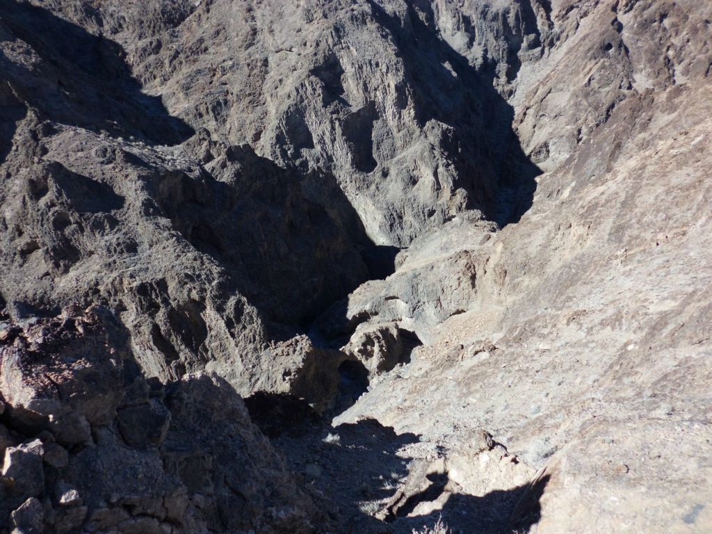 We hiked along the ridgeline, heading for an easier way to drop into the canyon above the bridge.  Here we are looking down at Tucki Bridge from another location: